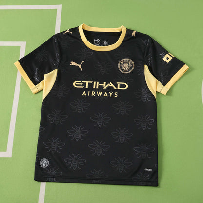 Camiseta de fútbol infantil de visitante negra del Manchester City F.C. para la temporada 2026-2027