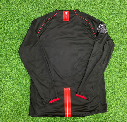 Maillot de football rétro noir Manchester United 2007/2008 avec écusson de la Ligue des champions