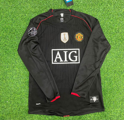 Maillot de football rétro noir Manchester United 2007/2008 avec écusson de la Ligue des champions