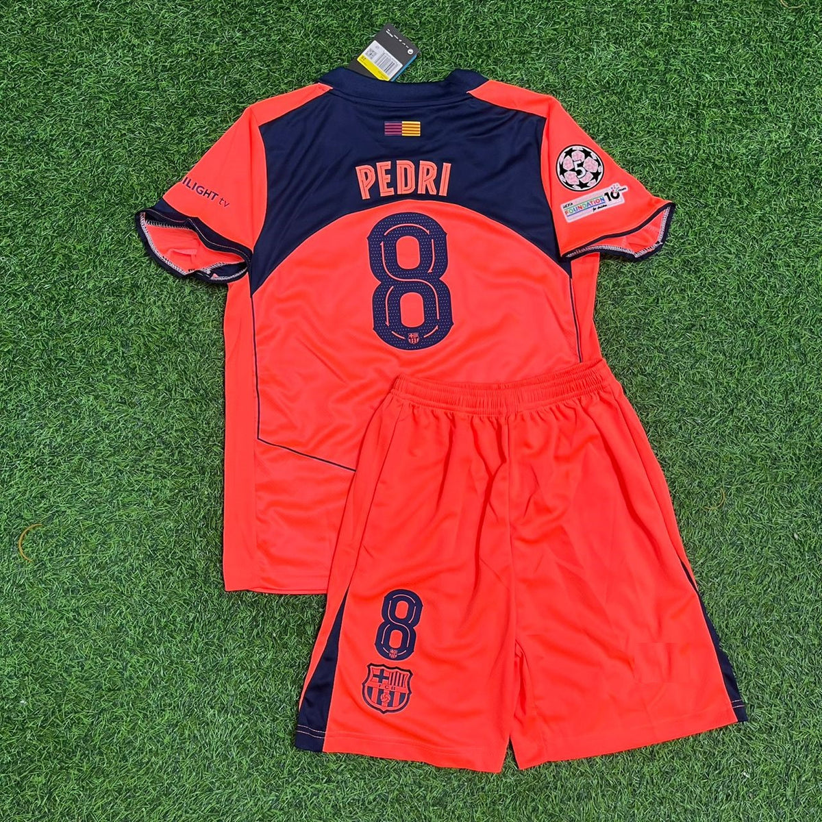 Nueva equipación de fútbol infantil naranja del Barcelona 2026 para la nueva temporada, Pedri