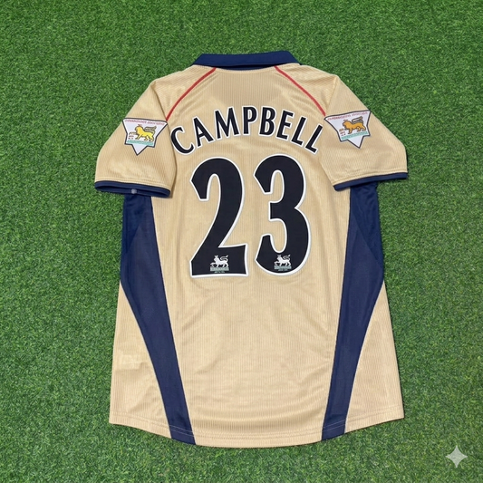 Camiseta retro dorada de visitante del Arsenal 2001-2002 de Sol Campbell #23